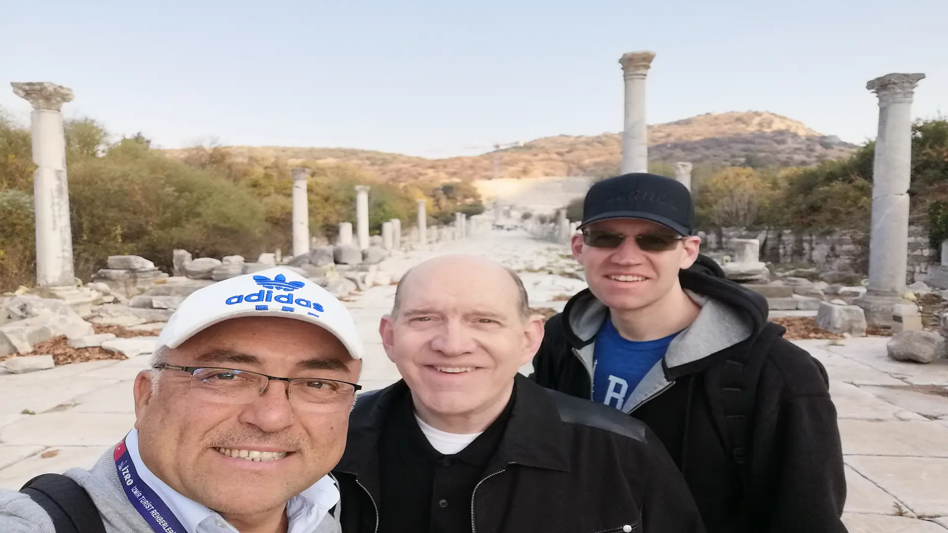 Professional guide with private guests on the Arcadian Way (Harbor Street) in Ephesus.