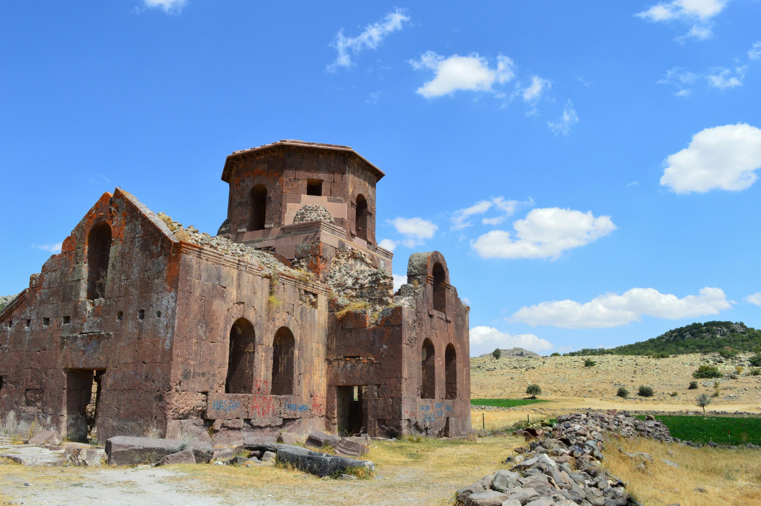 Explore the historical ruins of a Byzantine church under a clear blue sky in Aksaray, Turkey.