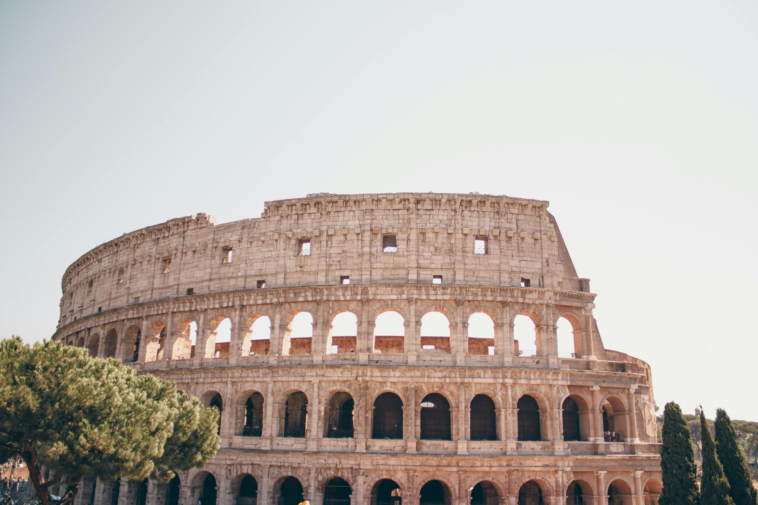 Stunning view of the Colosseum in Rome, showcasing its ancient architecture and historical significance.