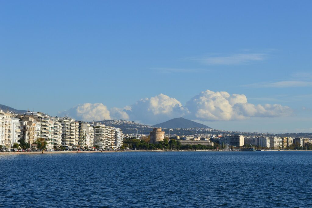 Beautiful seaside view of Thessaloniki, Greece featuring the iconic White Tower and city skyline.